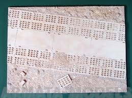 EDB-3503 Дополнения для моделей Model display base. Access road to a military training ground. Set contains following elements in 1/35 scale: 270?200 mm resin base filled with polyurethane foam, four silicone non slip pads.